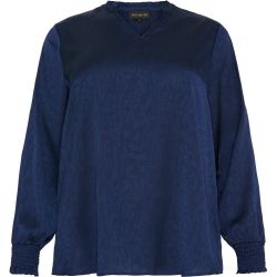 Blå plussize bluse med mønster, V-hals og elastiske manchetter, velegnet til hverdag og kontorbrug.