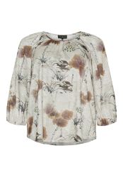 Skab et stilfuldt look med denne tidløse bluse