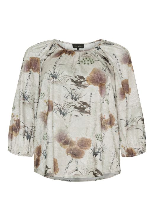 Skab et stilfuldt look med denne tidløse bluse