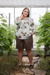 Let og elegant bluse med bladmønster