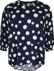 Let og luftig bluse med prikker og elegante detaljer.