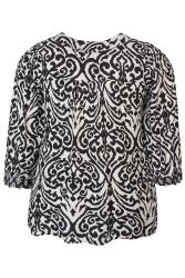 Ghia Blusen – en must-have til din garderobe.