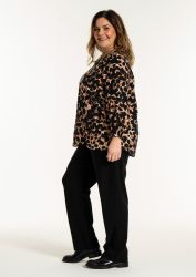 Sort bluse med brune og beige pletter