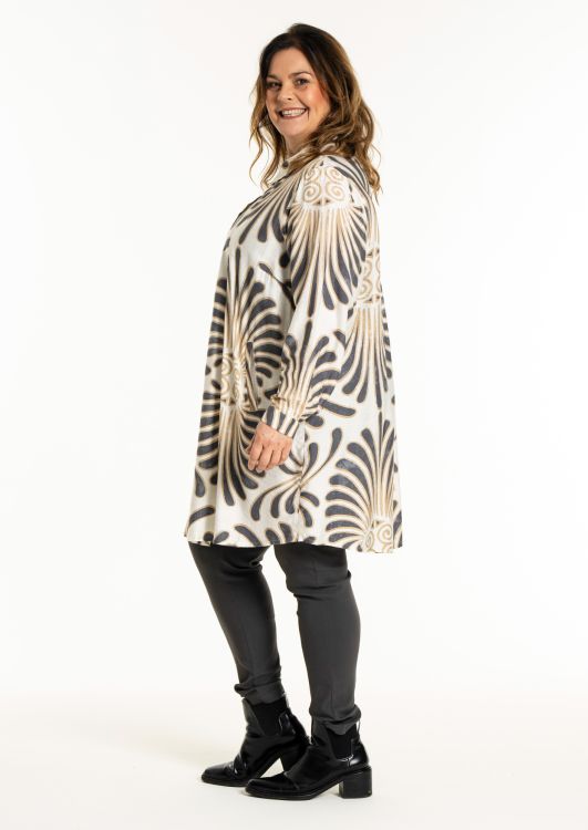 Lang skjortetunika med lommer og knaplukning