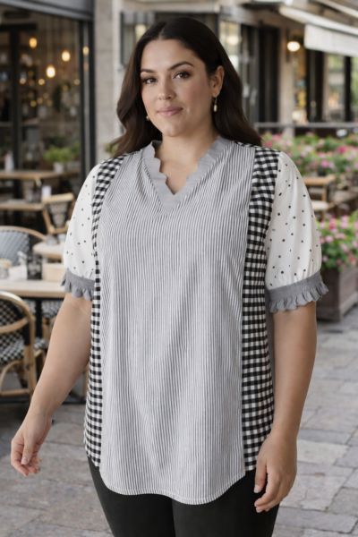 Stilfuld bluse med smukke mønsterkombinationer