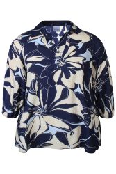 Detaljevisning af Zhenzi Amaya viskosebluse med mørk bund og lyst blomsterprint