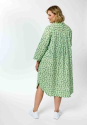 Let grøn kjole i bomuld med løs pasform og afrundet bund